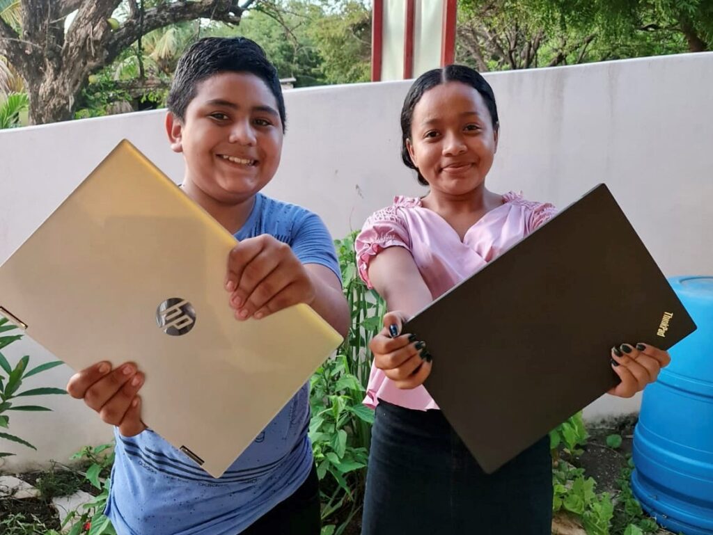 Children holding their brand-new gadgets