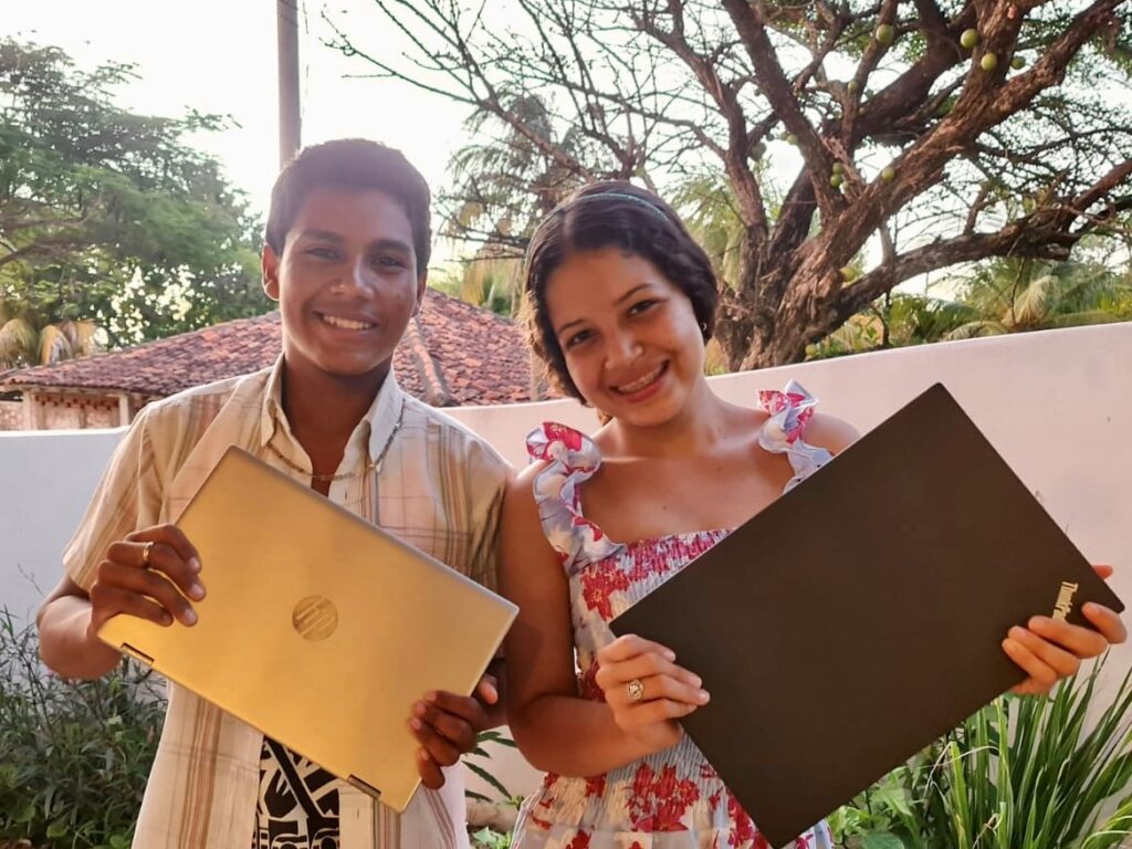 Children holding their brand-new gadgets