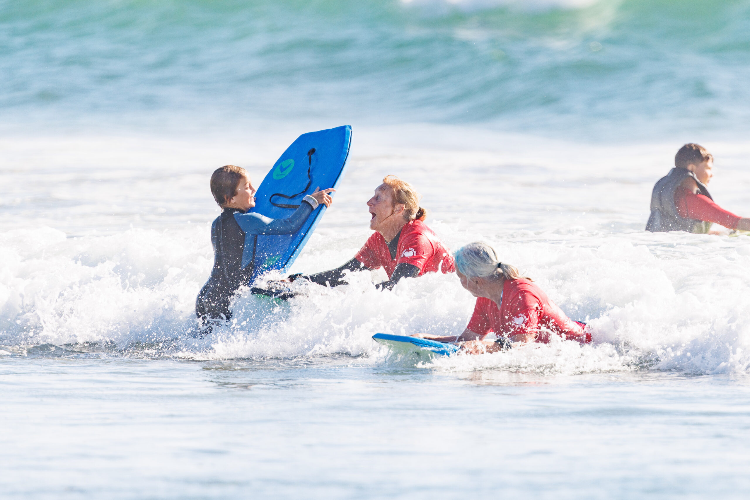 San Diego charity Unity 4 Orphans' wave-a-thon volunteers