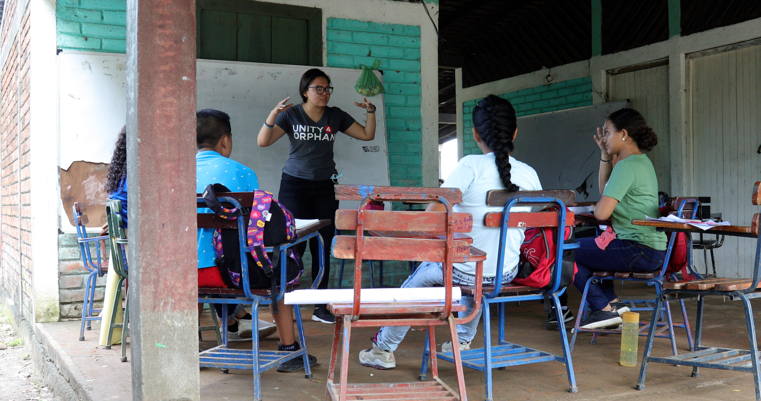 San Diego charity Unity 4 Orphans volunteer teaching children in Nicaragua