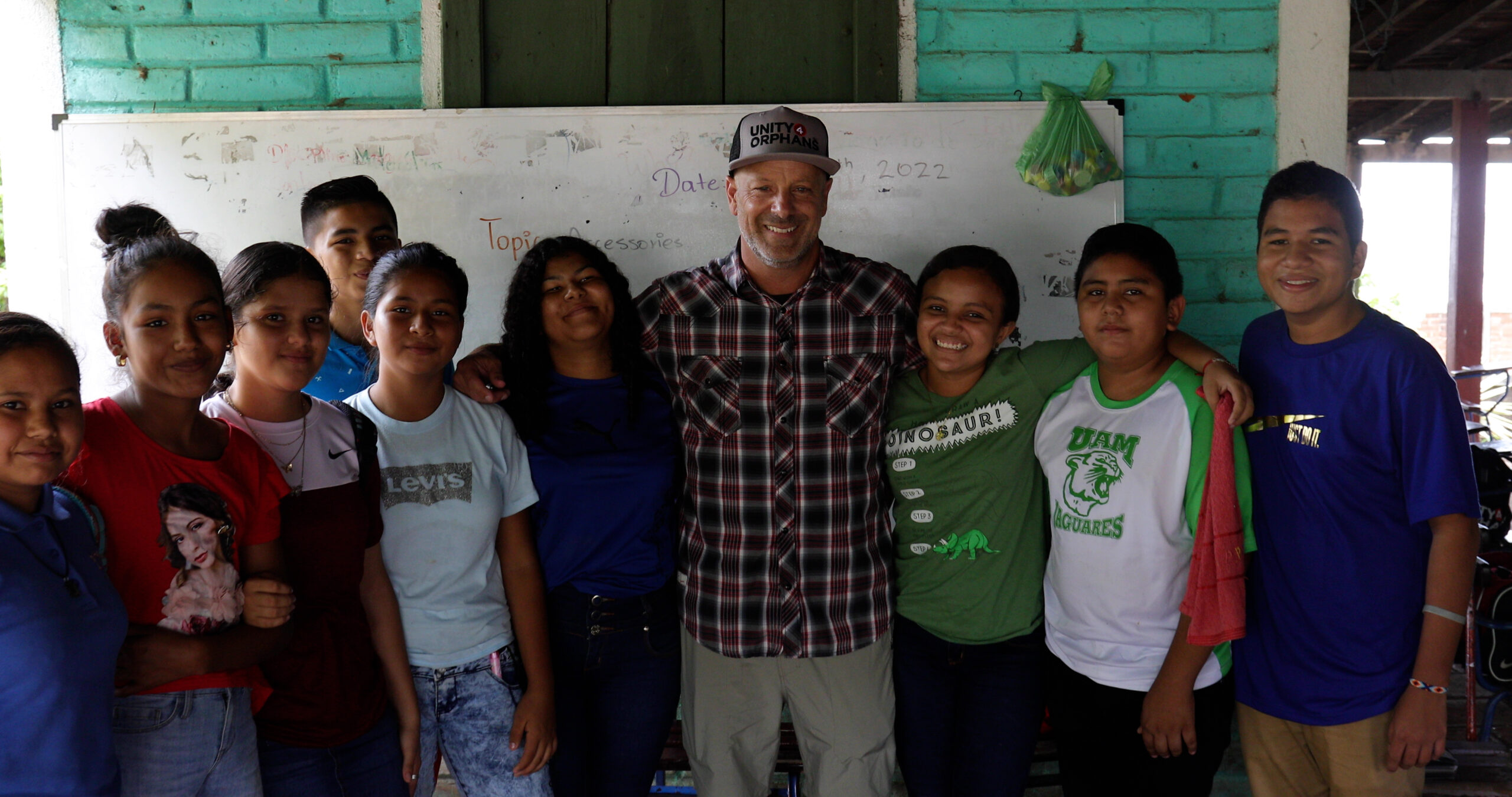 San Diego charity Unity 4 Orphans’ founder Joe Brandi with ESL students in Nicaragua