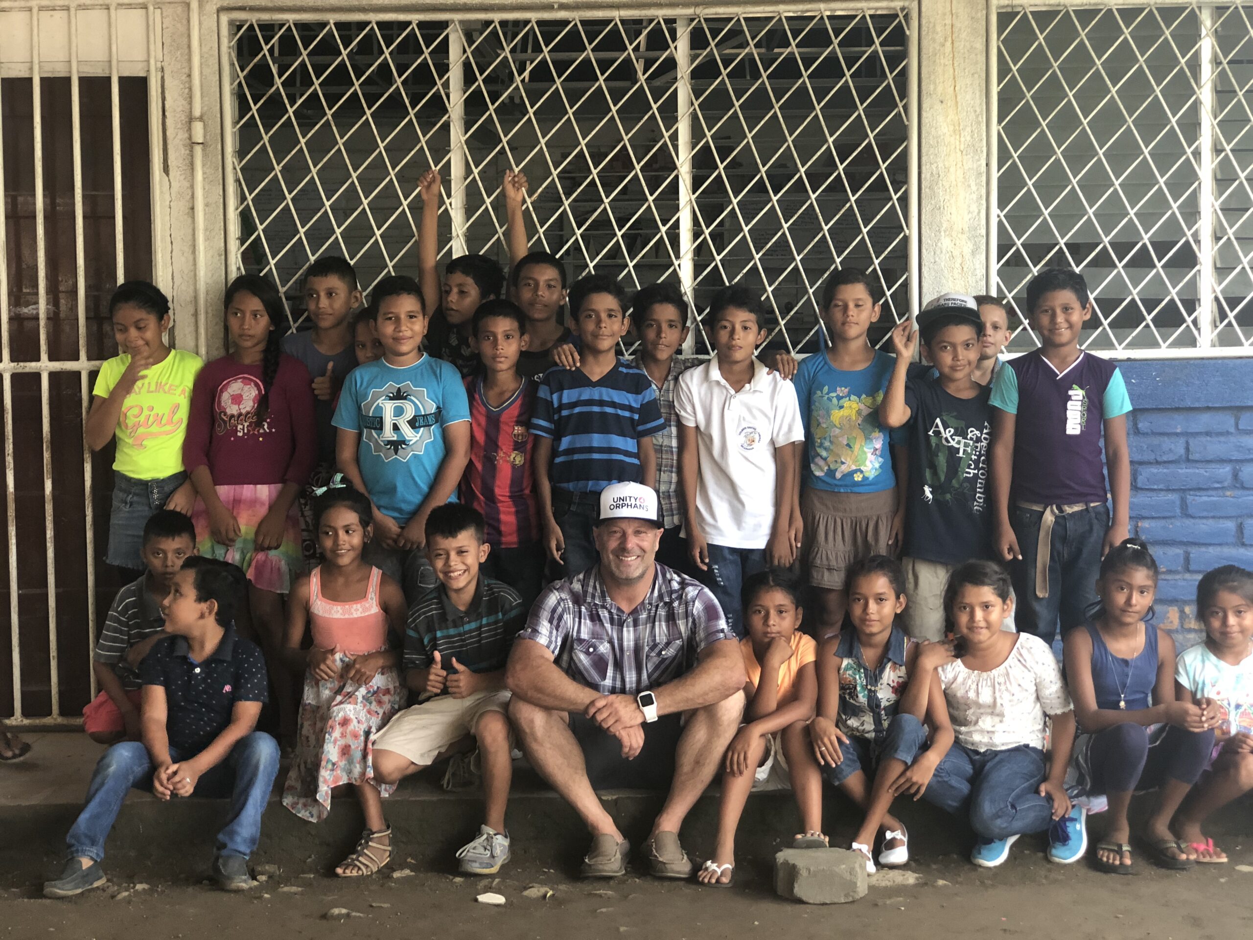 Unity 4 Orphans founder Joe Brandi with ESL students in Nicaragua