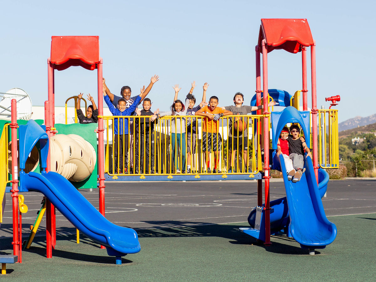 kids with San Diego charity Unity 4 Orphans Blast 4 Kids playing on a playground
