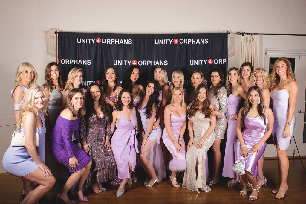 attendees at Unity 4 Orphans Open Hearts Gala pose together